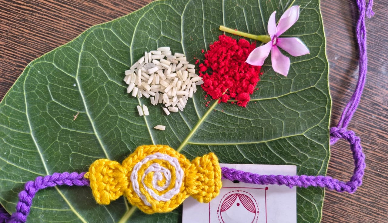 Crochet Yellow Toffee  rakhi