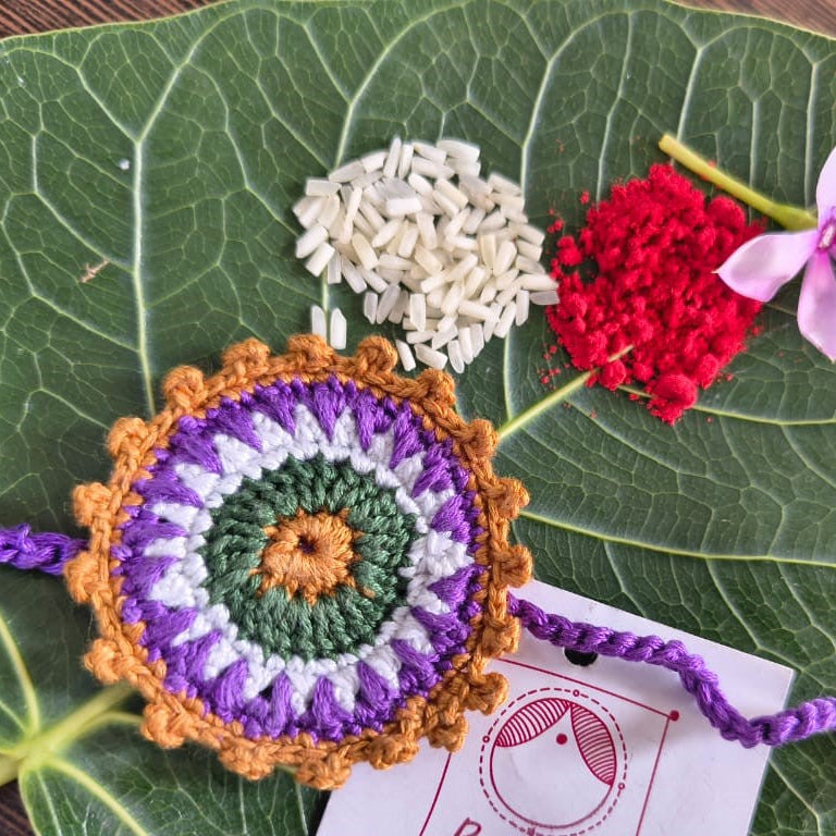 Crochet purple and mustard rakhi