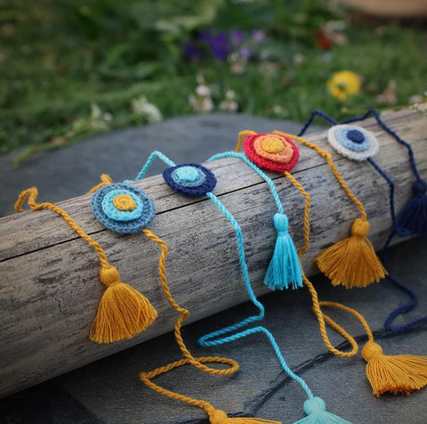 Handmade Crochet Rakhi - Blue & Yellow Chakra